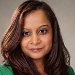 Pavitra ST in an emerald blazer